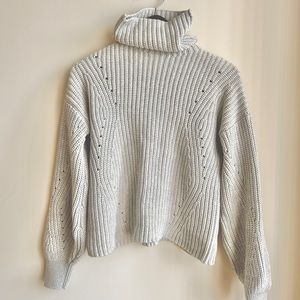 Brass statement sweater